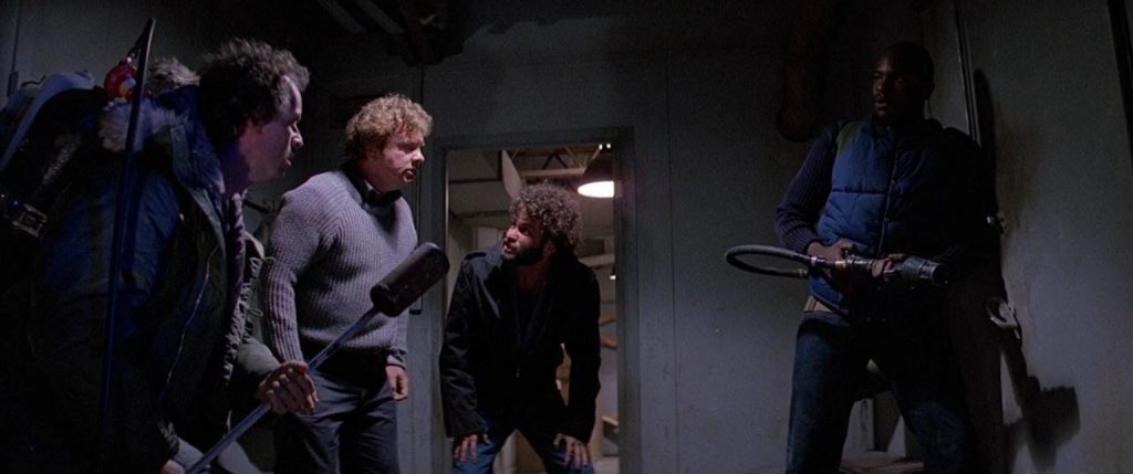 At the end of The Thing (1982) when MacReady and Childs were sitting down  when the camp was burning down, was one of them infected? Was it convenient  for the “Thing” because